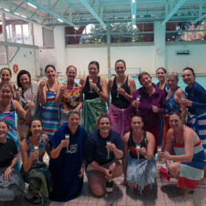 Moms from Renegades Water Polo Academy smiling together during a Saturday club session.