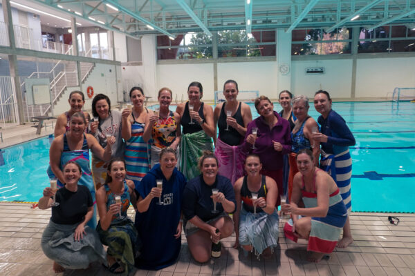 Moms from Renegades Water Polo Academy smiling together during a Saturday club session.